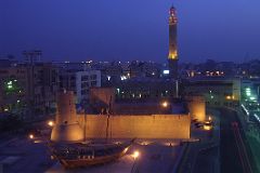 
Here is a nighttime view of the Dubai Museum from our hotel room window at the Arabian Courtyard Hotel. In front of the museum is a traditional dhow and beyond the Museum are the minarets of the Grand Mosque. Dubai Museum is located in the Al Fahidi Fort, an imposing building that once guarded the city from landward approaches. The fort was built around 1787 and is thought to be Dubai's oldest building. Since that time it has served as a garrison, a palace and a prison. In 1970, the fort was renovated and turned into a museum, and in 1995 additional galleries were completed.
